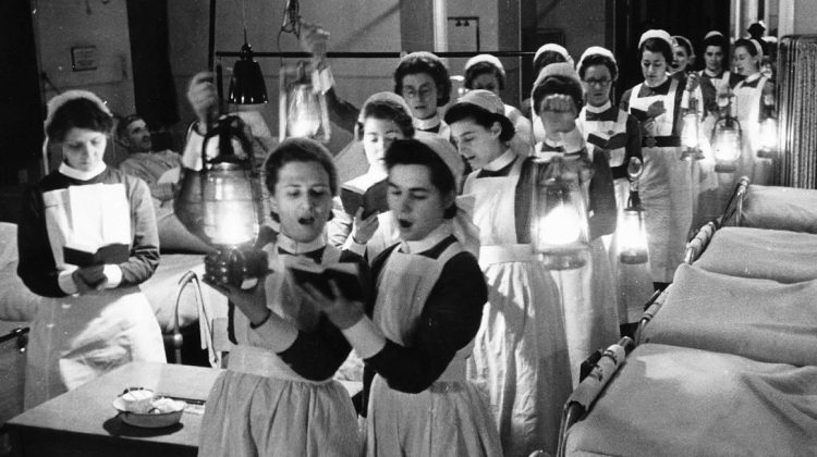 nurses singing to patients in hospital, 1940
